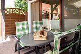 Ferienwohnung in Rettin - Bauernferienhof Kluvetasch Ostseekrabbe - &uuml;berdachte Terrasse Ostseekrabbe