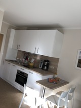 Ferienwohnung in Rettin - Bauernferienhof Kluvetasch Ostseekrabbe - Neue K&uuml;che Ostseekrabbe