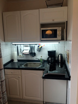 Appartement in S&uuml;sel - Haus Christa - Kochnische mit Mikrowelle und Induktionsherd