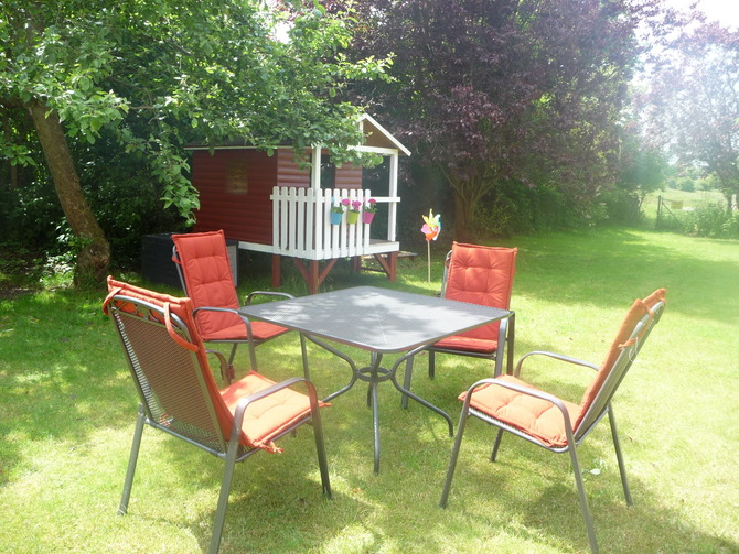 Ferienwohnung in Hans&uuml;hn - Ostsee Ferienhof Sandmann - Der G&auml;stegarten