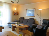 Ferienwohnung in Fehmarn OT Petersdorf - Fewo Bartels Kiebitzweg EG - Wohnzimmer mit Komfort-Sessel